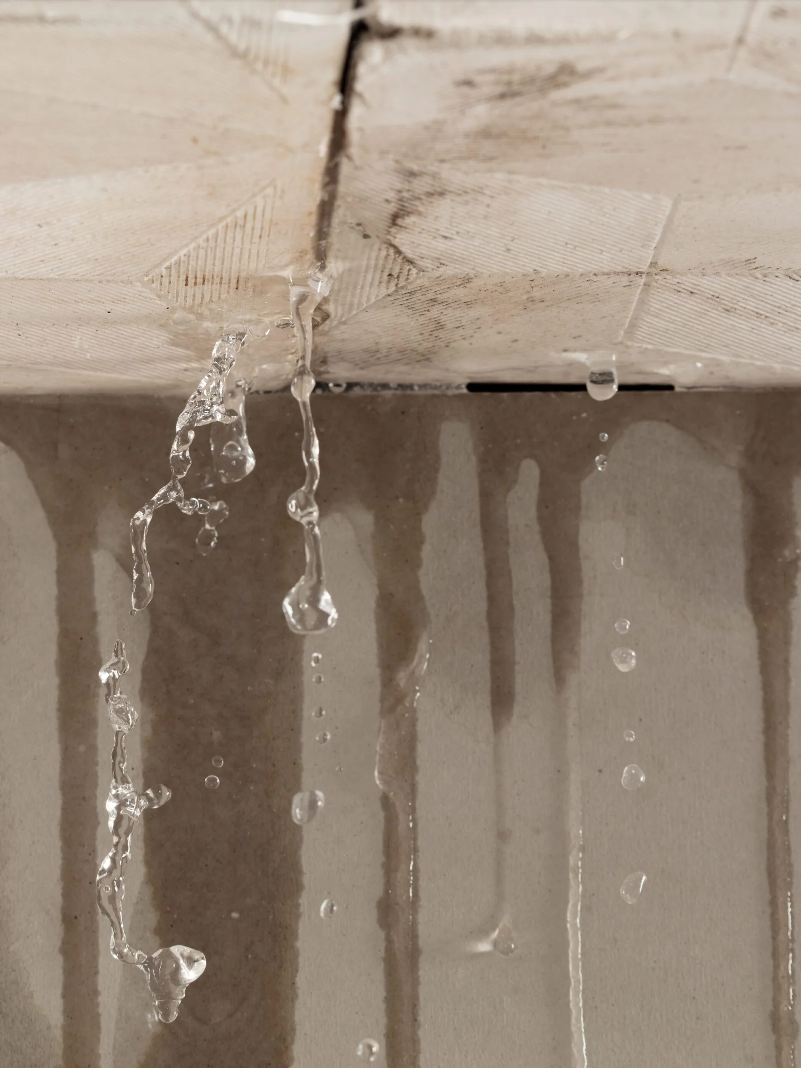Water leaking through a ceiling
